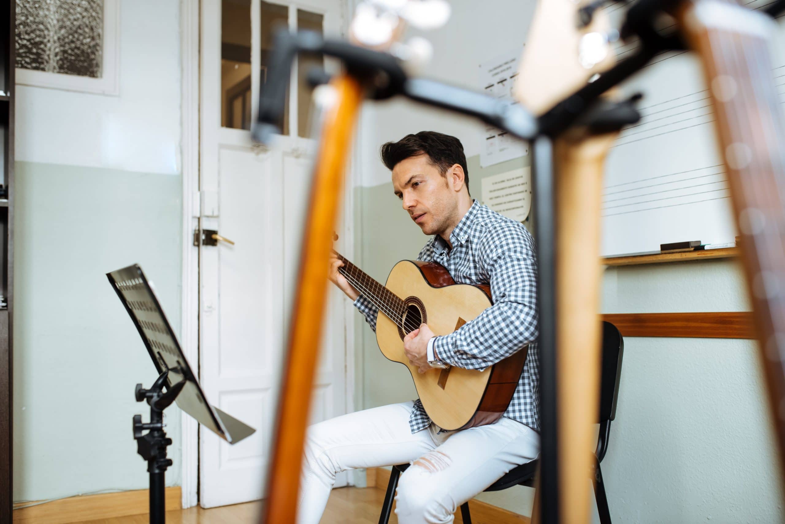 Man Reading Guitar Chords